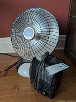 Presto parabolic heater and Honeywell space heater together showing overall condition and cords