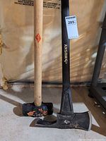 Husky splitting maul and Garant sledgehammer full view