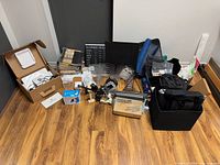 Wide view of complete lot showing Square Terminal, displays, signs, cords, binding machine