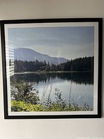 full view of framed photograph on wall