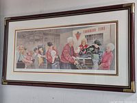 Full view of framed print on wall