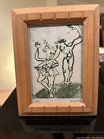 Front view framed art print with two dancers, edition and signature visible