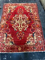 Full view of Persian Songhor rug showing overall design and colors