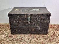 Front view of wooden military footlocker trunk