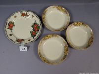 Group shot showing one octagonal plate and three round plates