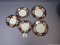 Group of five Royal Albert Heirloom Imari plates and saucers