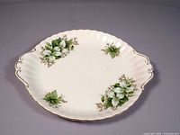 Top view of Royal Albert Trillium cake tray showing overall design and handles