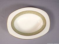 Top view of oval bowl showing interior pattern and gold rim