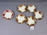 Group of six Royal Albert saucers, patterns visible