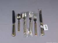 Full view of six flatware pieces laid out