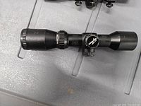 CenterPoint 4x32 scope left profile, shows eyepiece, turrets, tube, objective