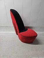 Left side view of red and black stiletto chair
