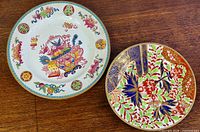 Both plates side by side showing complete decoration