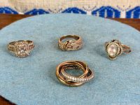 Group shot showing all four rose gold wash sterling rings