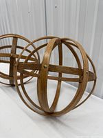 Close view of one wooden slat orb