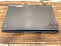 Top view of LG Blu-ray player showing overall condition and surface scratches