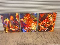 All three abstract canvases side by side