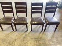 Front view of all four matching chairs side by side