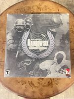 Front of collector’s edition box with Rainbow Six laurel design