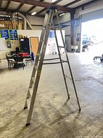 Full side view of 8 ft Werner aluminum A-frame ladder