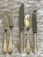 Five pieces showing pattern and monogram