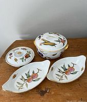 Full set: two covered casseroles and two oblong dishes