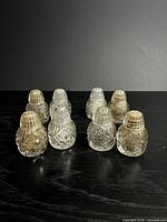 All eight matching shakers front angled view