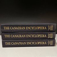 Spines of three volumes showing title and publisher logos