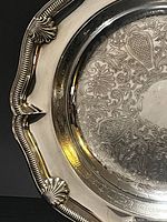 Close-up of engraved interior and rim of tray