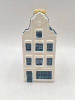 Front view of KLM Delft Blue miniature house bottle