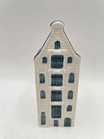 Front view of Delft Blue house showing windows and door