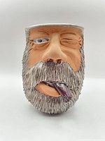 Front view showing sculpted face details