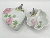 Heart-shaped lidded box beside scalloped handled bowl, showing overall design and matching pattern