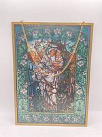 Full view of framed stained glass panel with chain
