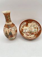 Vase and bowl front view showing full forms and painted scenes