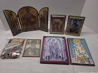 Group shot of all icons, prints, medals bag