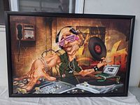 Full view of framed DJ artwork