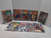 All ten bagged comic books laid out showing covers