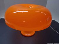 Full view of orange mushroom lamp