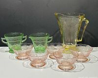 Group view of all eight depression glass pieces