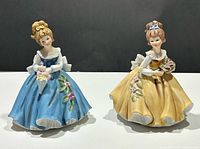 Both Giftcraft porcelain figurines front view