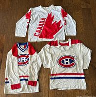 Front view of all three jerseys side-by-side