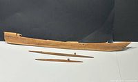 Main hull and two outrigger floats laid out