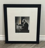 Full view of framed Karsh self-portrait
