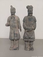 Front view of both Chinese warrior figurines