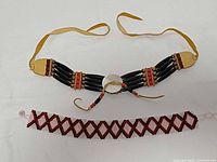 Leather and beaded band chokers full view