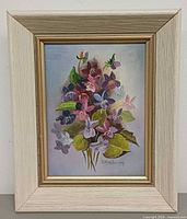 Framed floral painting front view