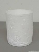 front view showing relief figure scene