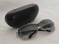 Sunglasses with case angled view