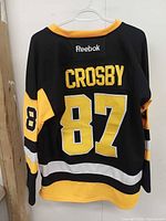 Back view showing CROSBY name and 87 numbers